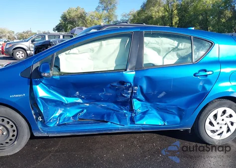 2016 Toyota Prius C Two z USA, uszkodzony, nr VIN JTDKDTB32G1132705